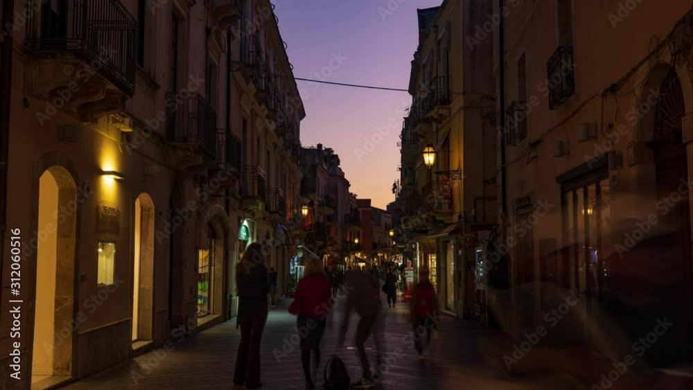 Timelapse view of Taormina high street floodlit at night Timelapse view of Taormina high street floodlit at night