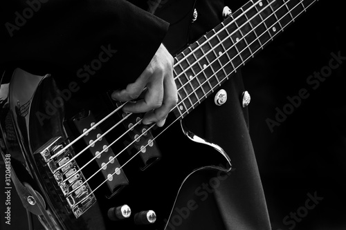 bass guitar player and details