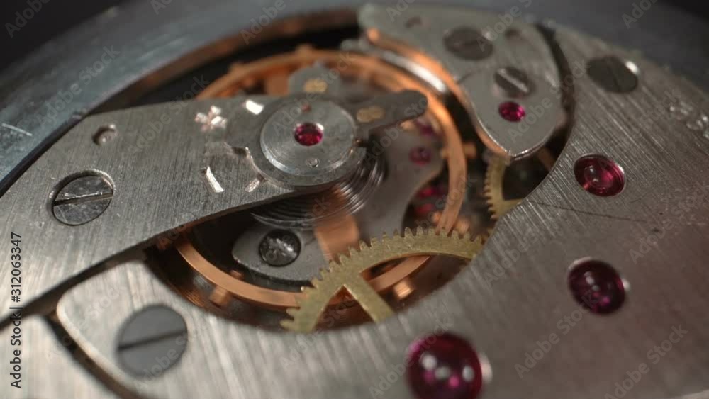 custom made wallpaper toronto digitalThe gears of the working mechanical watches are stopped with a wooden stick. Macro Slow motion