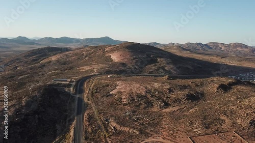 4K high quality sunny morning aerial panorama footage of spectacular scenic Springbok town, set among rocky mountains in Northern Cape province, South Africa near the border with neighbouring Namibia photo