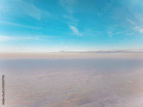 sky from an airplane porthole