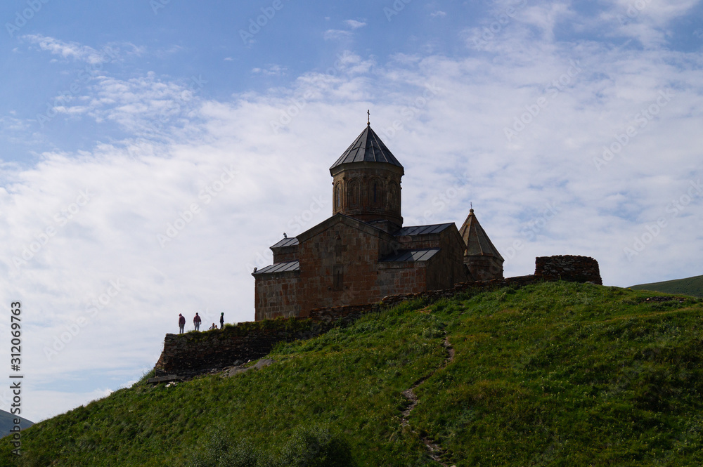  Trinity Church. Kazbek Stepantsminda. Georgia. Temple in the mountains against the backdrop of the mountains.