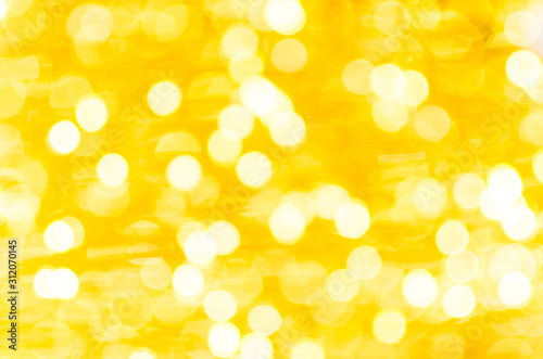 Abstract Bokeh background of defocused glittering lights. Christmas, Party, New Year, luxurious background pattern concept. banner