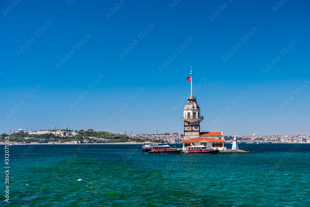 The Maiden's Tower, also known as Leander's Tower since the medieval Byzantine period, a tower lying on a small islet located at the southern entrance of the Bosphorus strait, view form cruise ship