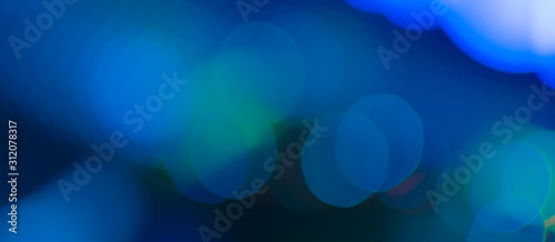 Abstract Bokeh color background of defocused glittering lights. Christmas, Party, New Year, luxurious  background pattern concept. banner