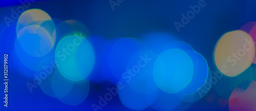 Abstract Bokeh color background of defocused glittering lights. Christmas, Party, New Year, luxurious  background pattern concept. banner
