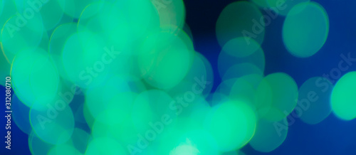 Abstract Bokeh color background of defocused glittering lights. Christmas, Party, New Year, luxurious  background pattern concept. banner