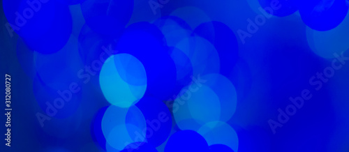 Abstract Bokeh color background of defocused glittering lights. Christmas, Party, New Year, luxurious  background pattern concept. banner