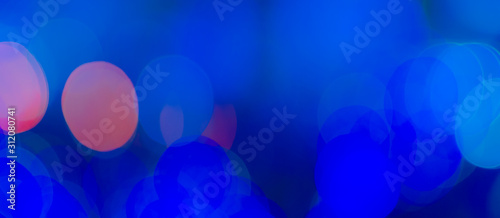 Abstract Bokeh color background of defocused glittering lights. Christmas, Party, New Year, luxurious  background pattern concept. banner