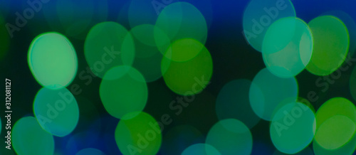 Abstract Bokeh color background of defocused glittering lights. Christmas, Party, New Year, luxurious  background pattern concept. banner