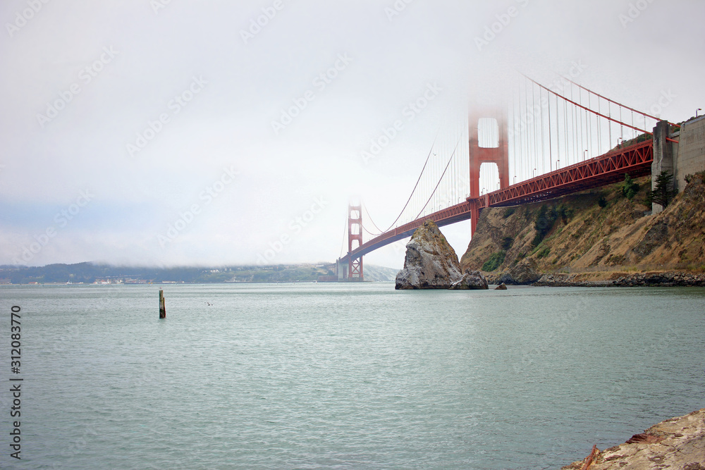 Fototapeta premium Foggy Golden Gate Bridge in San Francisco