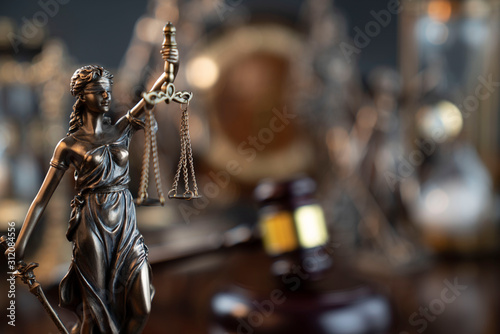 Law symbol composition and background. Judge's gavel, Themis statue and scale.