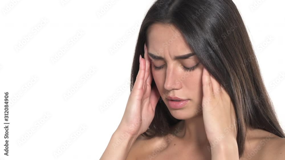 Young woman having headache. Close-up of portrait of young girl touching head. Female migraine Young woman having headache. Close-up of portrait of young girl touching head. Female migraine