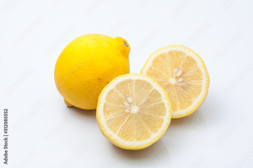 fresh lemons on white background