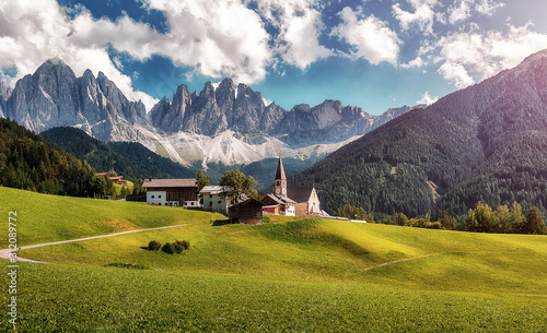 Wonderful Summer mountains landscape. Impessive Dolomites Alps. Santa Maddalena village with majestic Dolomites mountains in background, Val di Funes valley, Trentino Alto Adige region, Italy, Europe
