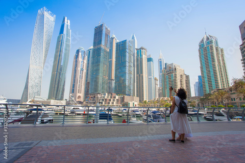 Dubai Marina city in United Arab Emirates. tourist taking photos in Marina © Ioan Panaite