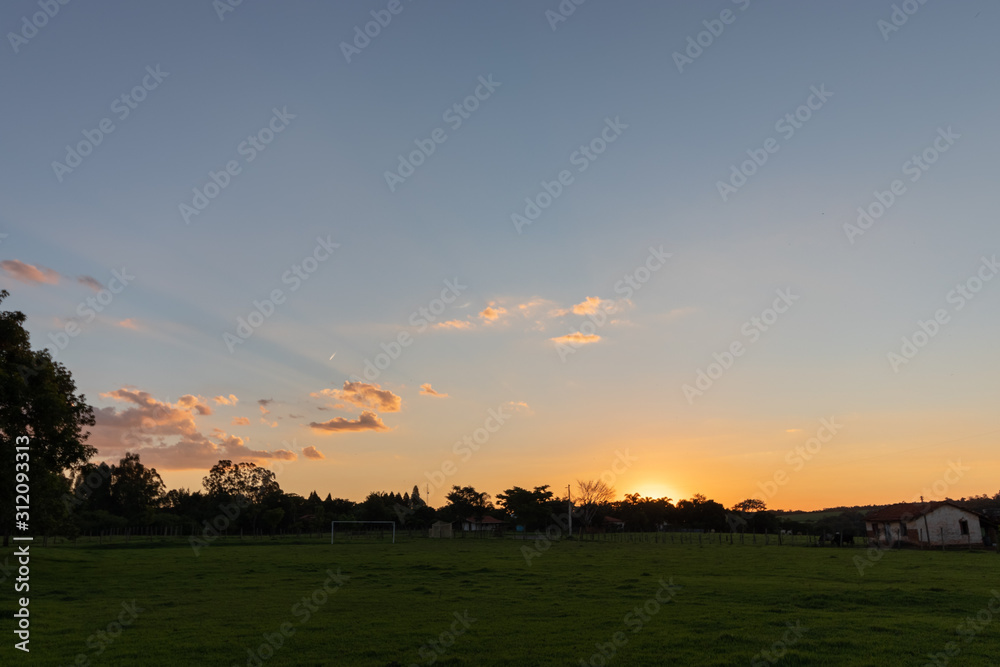 sunset over field