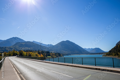 faller klamm bridge over sylvenstein reservoir in german alps photo