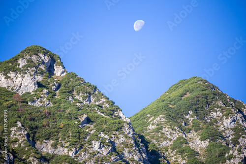 moon over mountains in german alps
