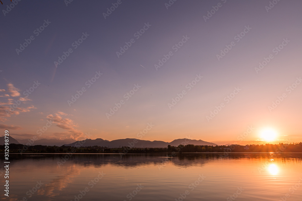 sunset over riegsee bavaria germany