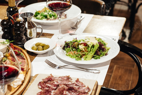 Wallpaper Mural served table in the restaurant for a banquet with appetizers, salads and wine Torontodigital.ca