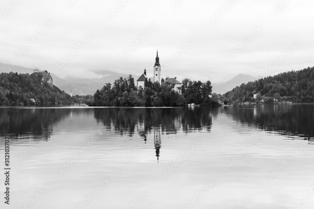 Famous Bled Lake in Triglav National Park in the Julian Alps in black and white, Slovenia