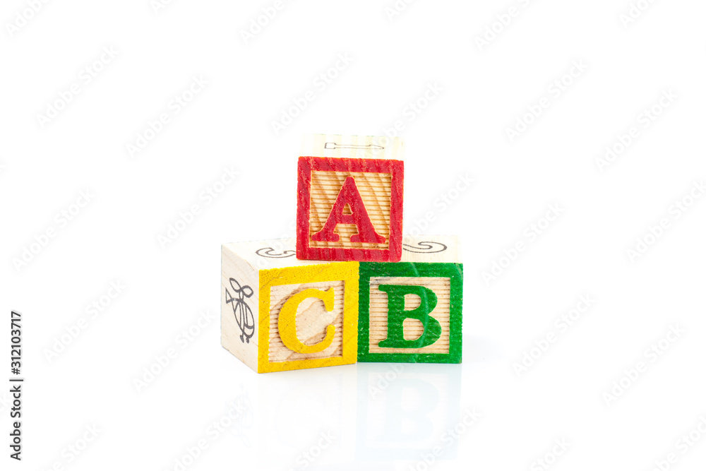 Toy blocks with letters A, B and C isolated on white Toy blocks with letters A, B and C isolated on white