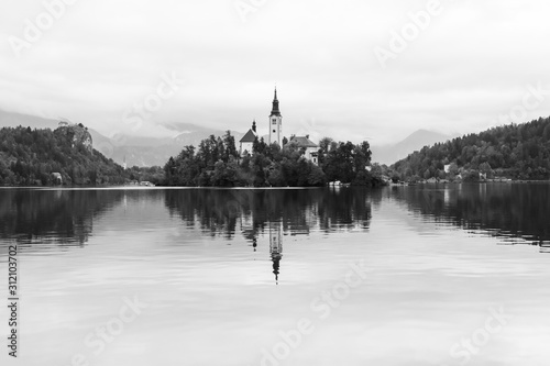 Obraz na płótnie Famous Bled Lake in Triglav National Park in the Julian Alps in black and white, Slovenia w salonie