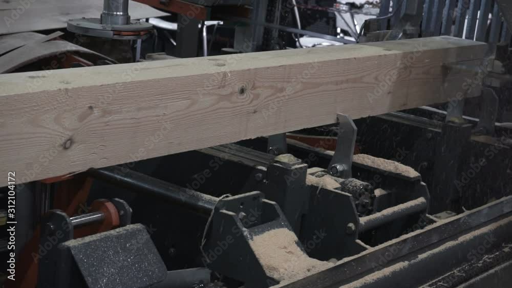 The process of processing logs in sawmill equipment. Sawing logs at sawmill equipment.1920X1080 Full Hd. The process of processing logs in sawmill equipment. Sawing logs at sawmill equipment.1920X1080 Full Hd.