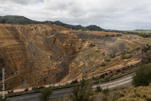 Open-cast gold mine in Waihi, Hauraki, New Zealand. A huge landslide can be seen on the far wall of the pit.