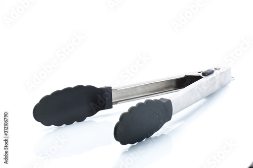 cooking tongs on a white background photo