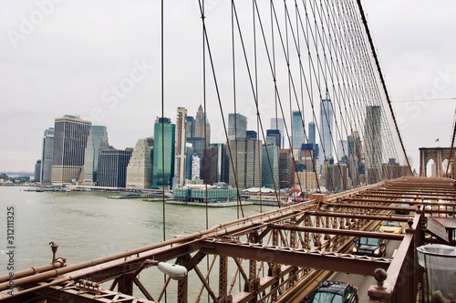 Brooklyn Bridge on a cloudy day © studiosacco