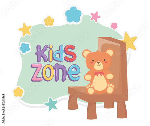 kids zone  teddy bear sitting on chair