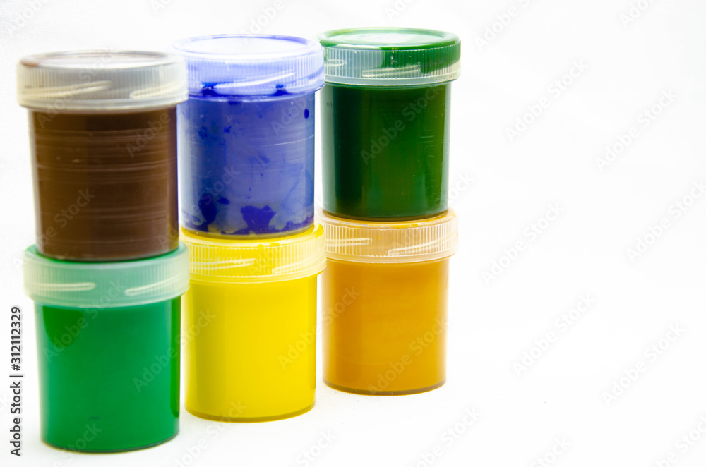 Gouache paints for drawing. Paints for painting in banks. Paints for the artist in a row, in a bunch, in macro. Art. Gouache paints for drawing. Paints for painting in banks. Paints for the artist in a row, in a bunch, in macro. Art.