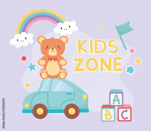 kids zone, teddy bear sitting on blue car toys