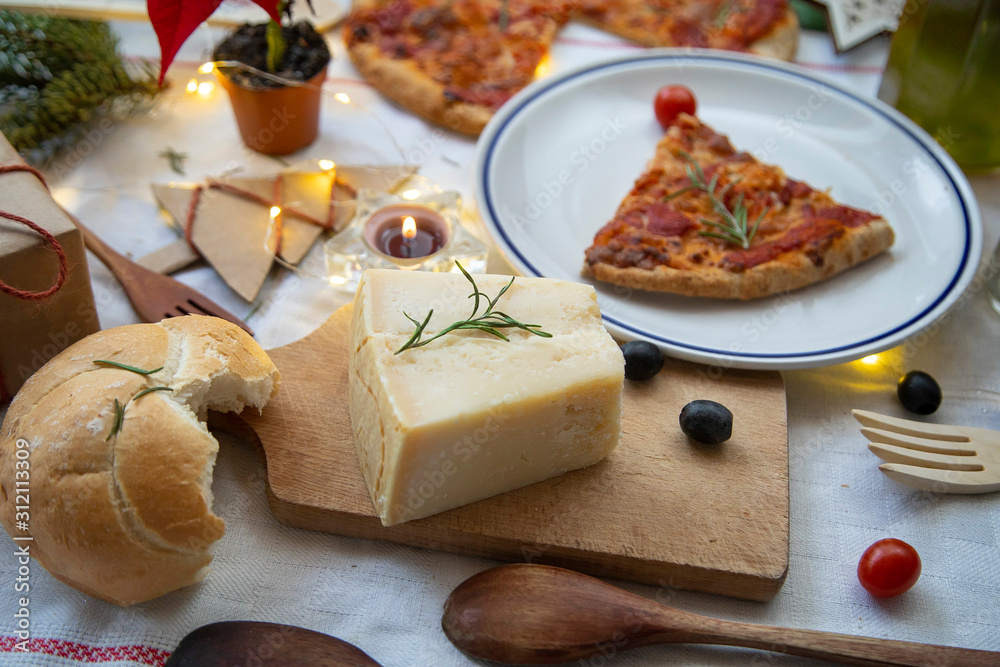 Christmas gala dinner. Traditional italian cheese Parmesan