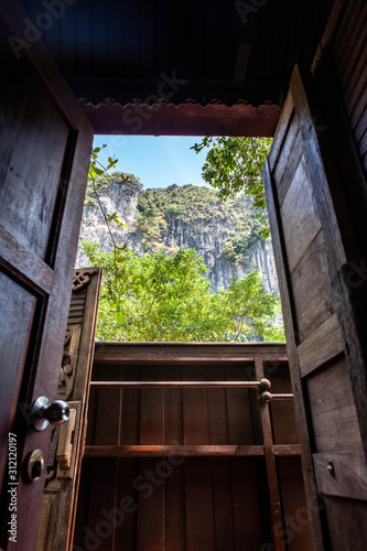 Open window and doorway in a beach house at Railay Beach  Thailand 