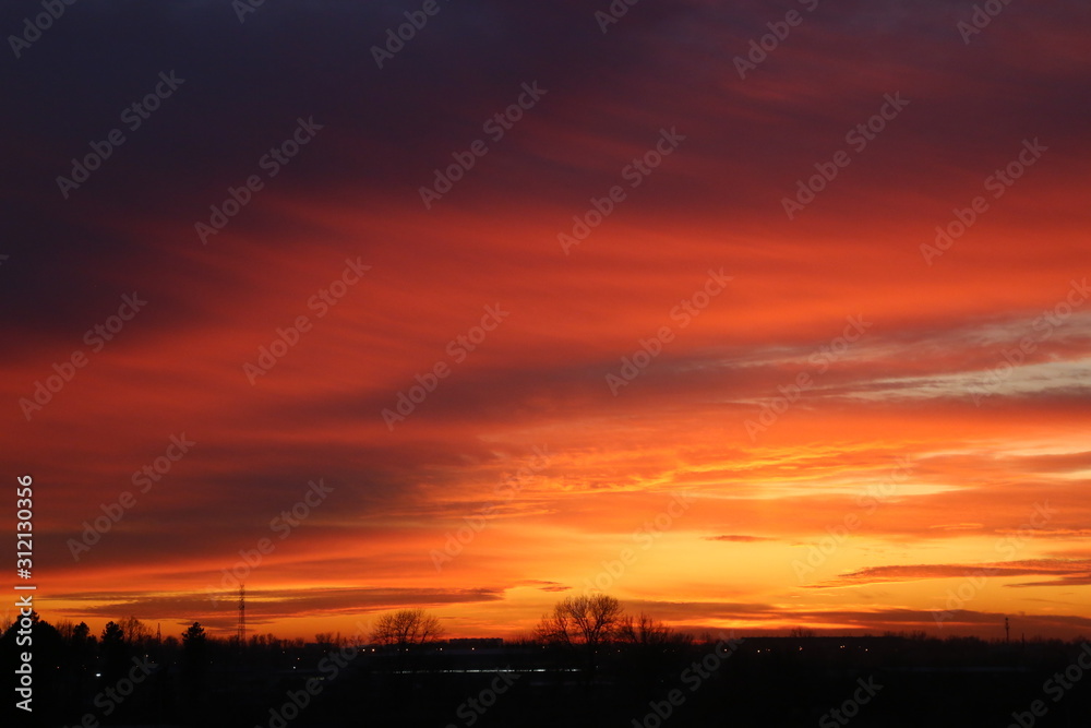 Beautiful red dramatic sky during sunset. Abstract wallpaper. 