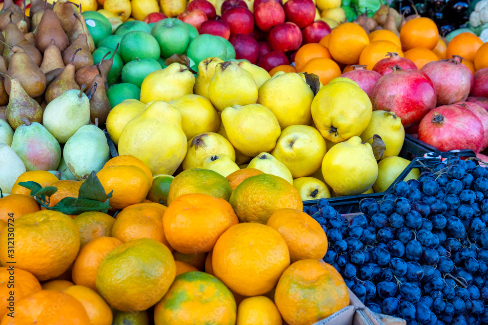 Various fresh fruits at farmer market. Vitamin.