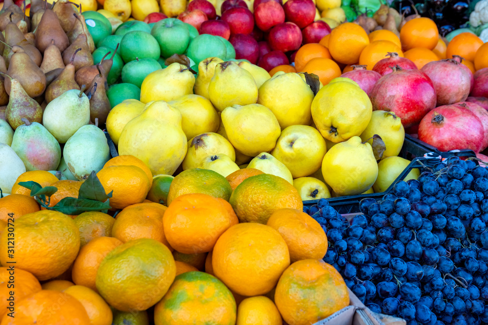 Various fresh fruits at farmer market. Vitamin. Various fresh fruits at farmer market. Vitamin.