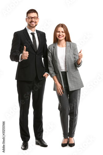 Business people showing thu...