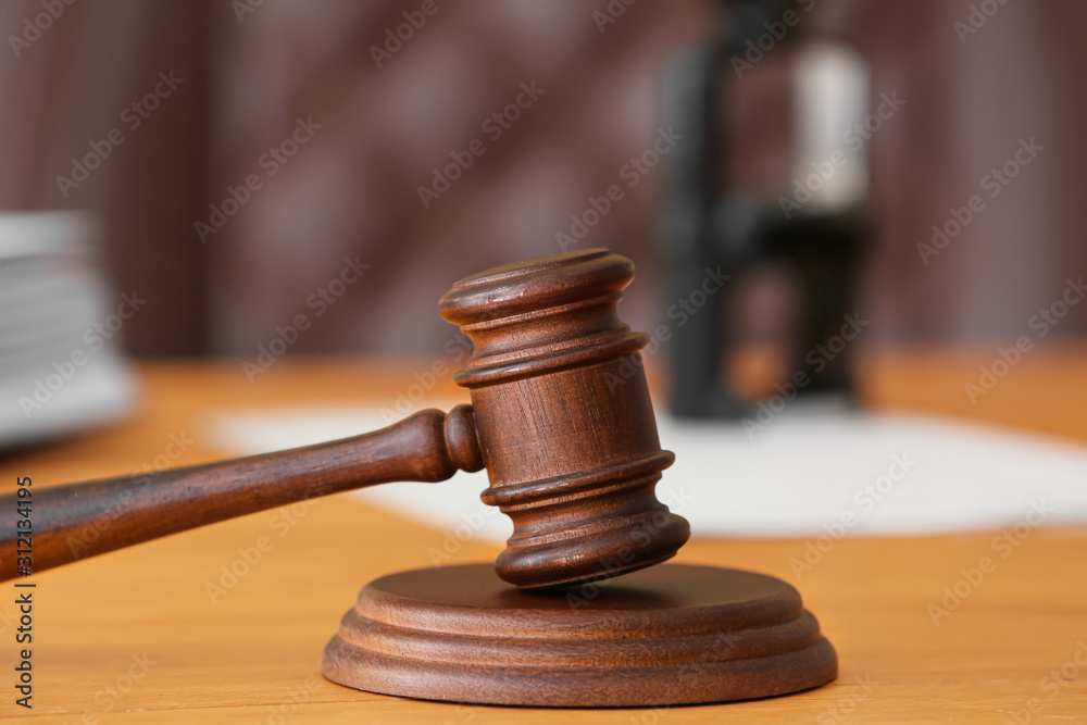Judge's gavel on table in office Judge's gavel on table in office