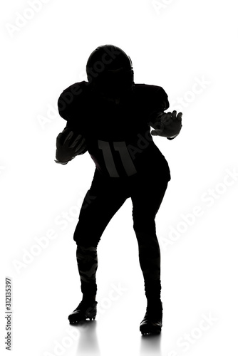 Silhouette of American football player on white background