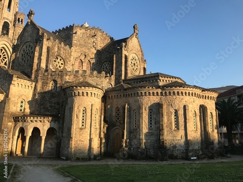 O Carballiño, Ourense / Spain - July 8 2018: Ground level view of the church of Vera Cruz in the city of O Carballiño in Galicia Spain during a sunny day photo