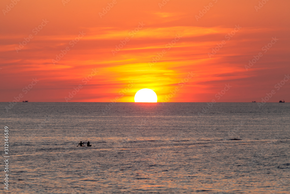 red sunset above the sea at Kata beach Phuket Thailand