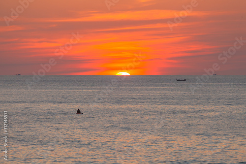 red sunset above the sea at Kata beach Phuket Thailand