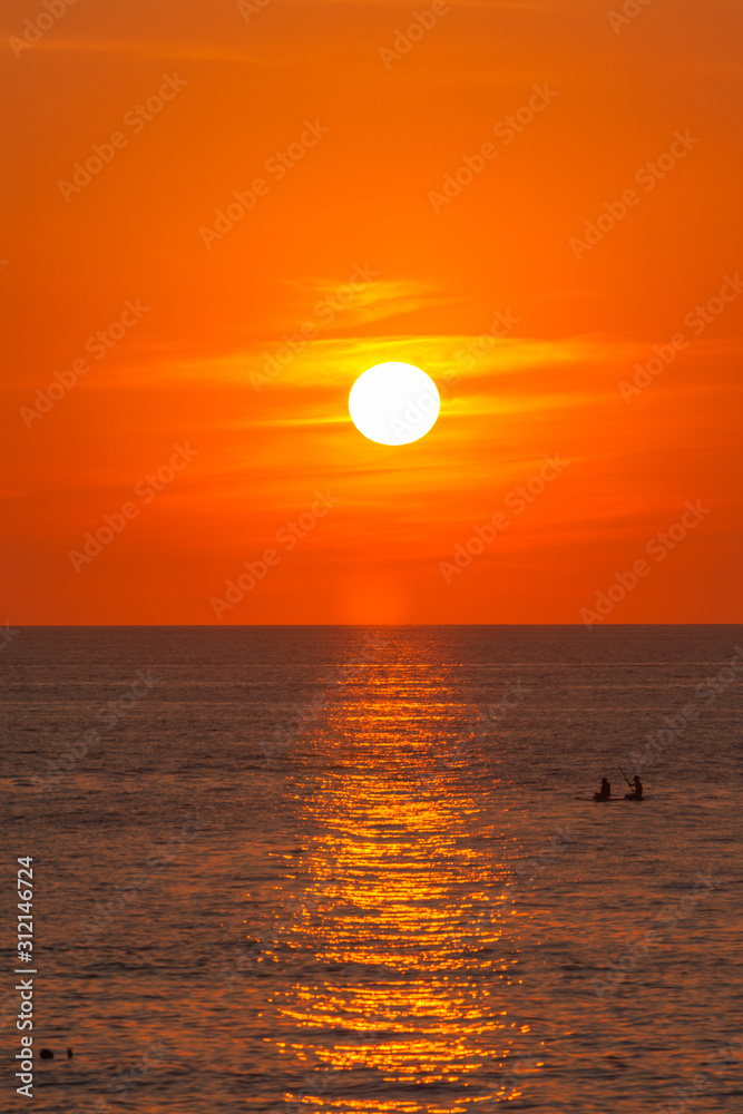 red sunset above the sea at Kata beach Phuket Thailand red sunset above the sea at Kata beach Phuket Thailand