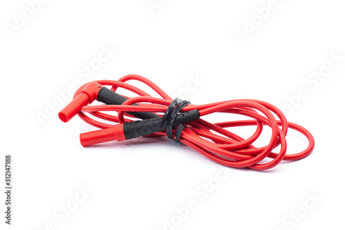 Red cable of multimeter on white background