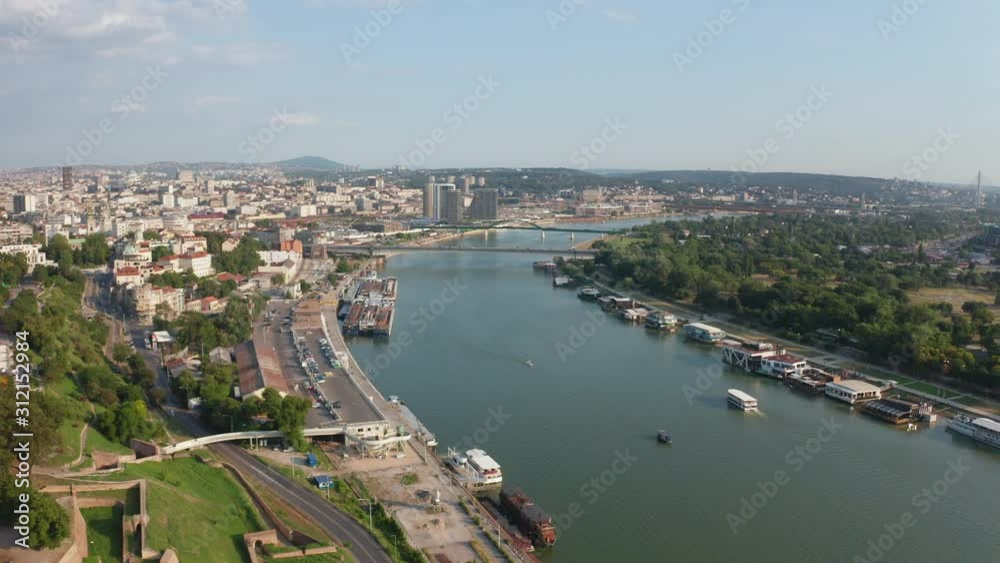 Danube river filmed with drone forwarding drone to capture amazing Belgrade capital city of Serbia with amazing summer and green nature. Danube river filmed with drone forwarding drone to capture amazing Belgrade capital city of Serbia with amazing summer and green nature.