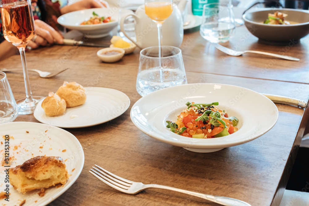 colorful and trendy brunch table on a bright day 